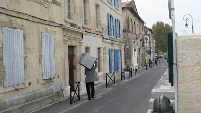 Man Carrying Oven
